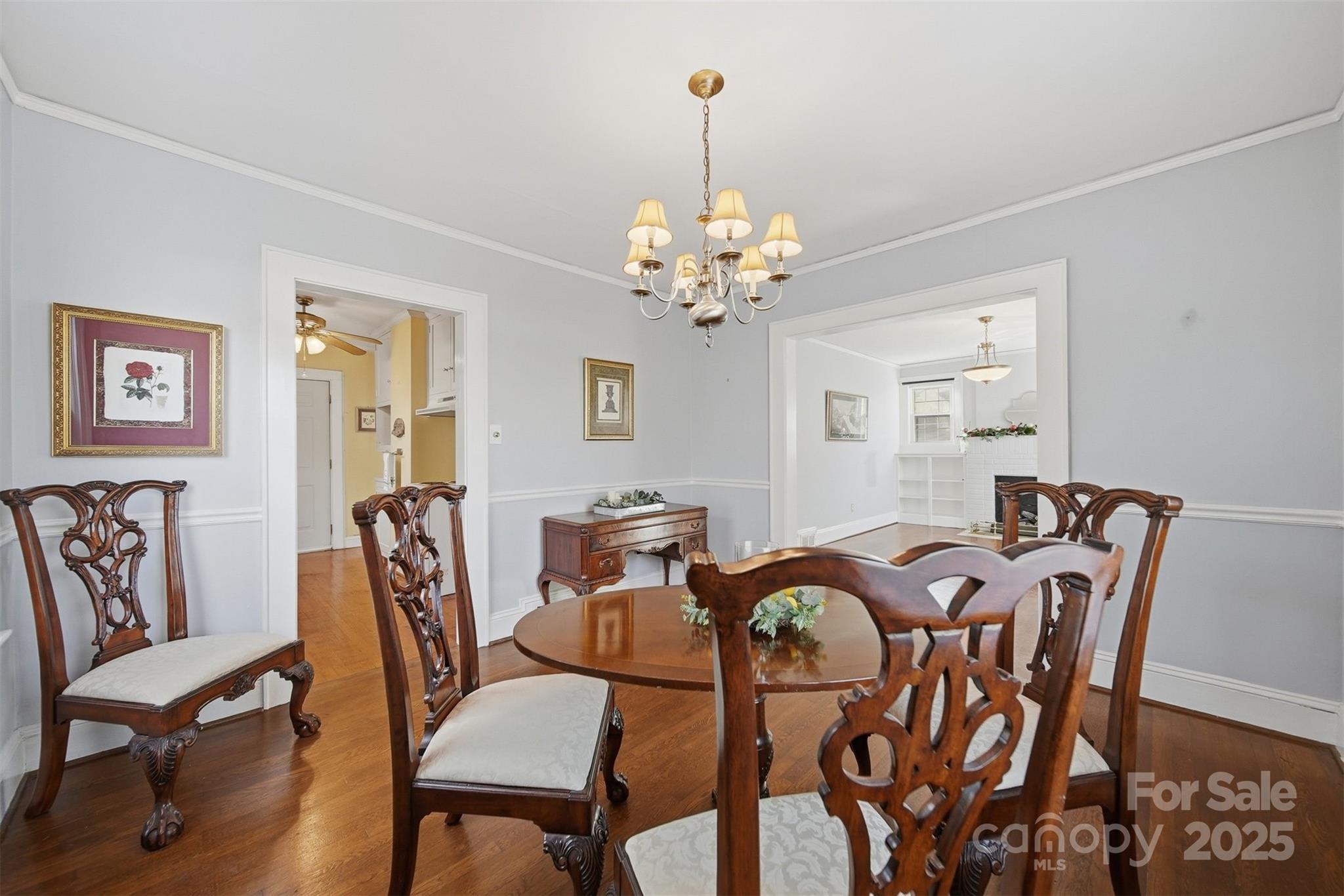 323 4th St Place Southwest Hickory, NC 28602 - Photo 7 of 32 a view of a dining room with furniture and chandelier