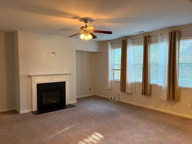 a view of a livingroom with a fireplace