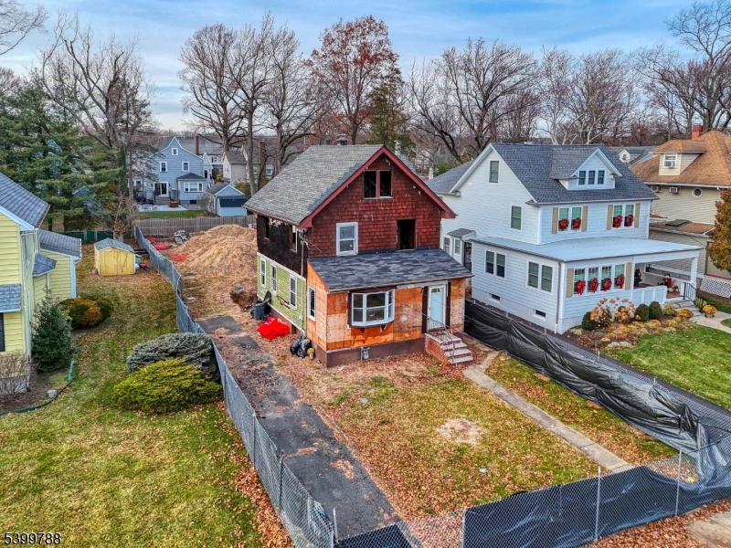 608 Hort Street Westfield, NJ 07090 - Photo 1 of 17 aerial view of a house with swimming pool and large trees