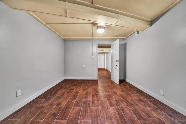 a bathroom with a toilet a sink and shower
