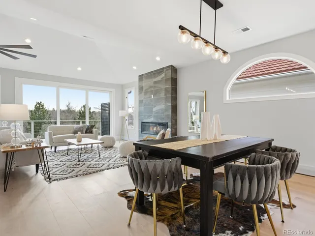 a view of a dining room with furniture window and outside view