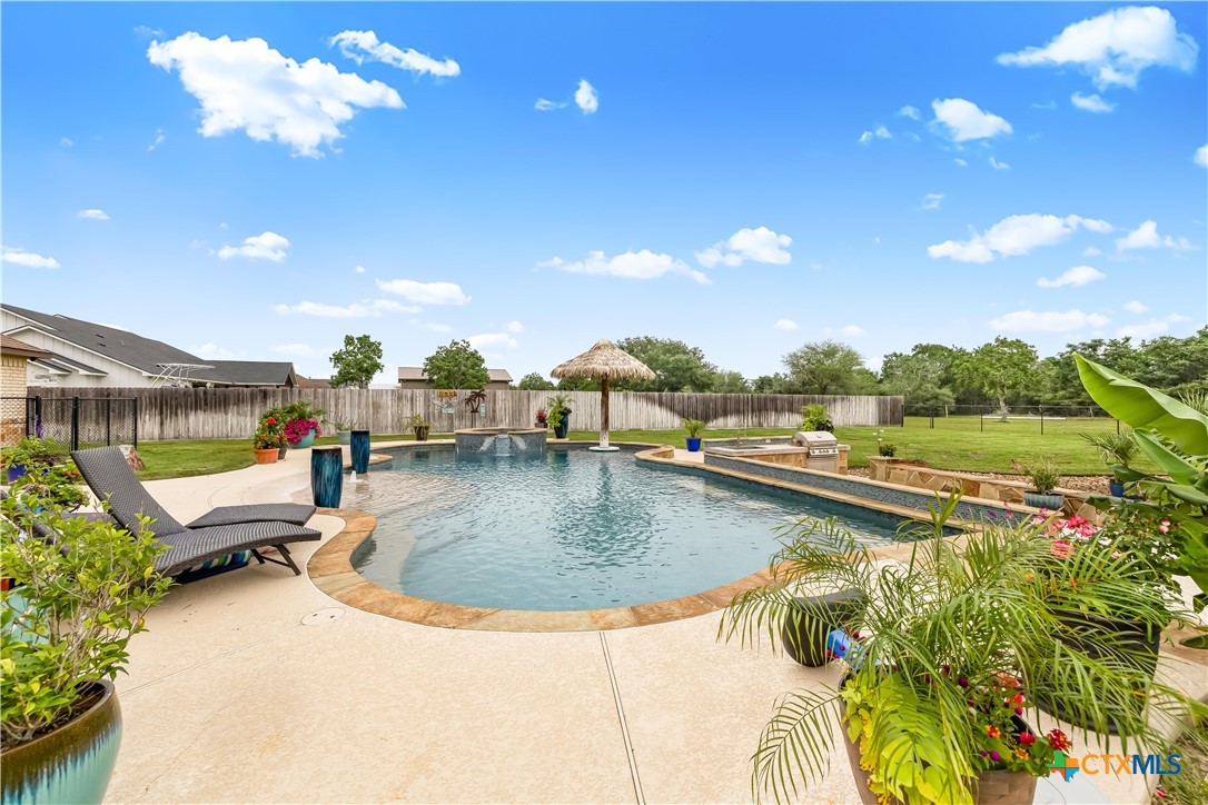 254 Sendera Loop Victoria, TX 77904 - Photo 14 of 48 a view of a swimming pool with a patio