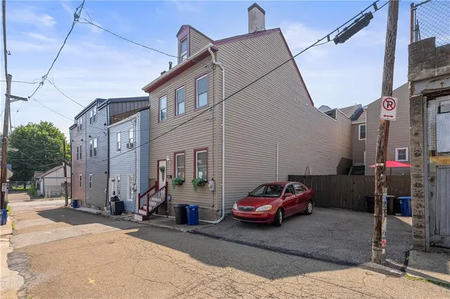 a car parked in front of a building