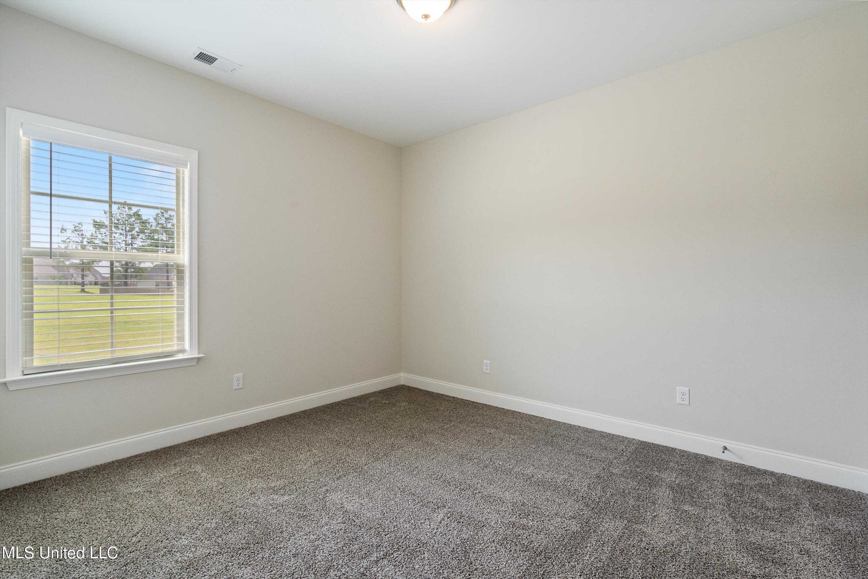 5327 Malone Road North Olive Branch, MS 38654 - Photo 17 of 36 Downstairs Bedroom