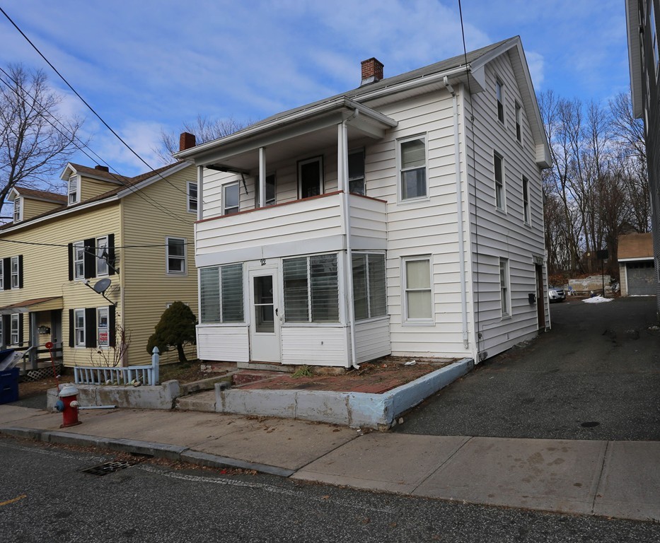 22 Vigeant Street Ware, MA 01082 - Photo 1 of 16 a front view of a house with yard