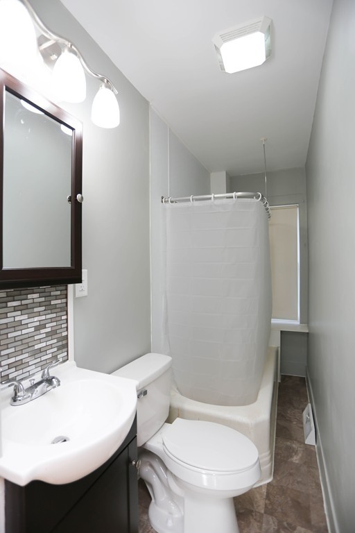 22 Vigeant Street Ware, MA 01082 - Photo 13 of 16 a bathroom with a sink toilet and mirror