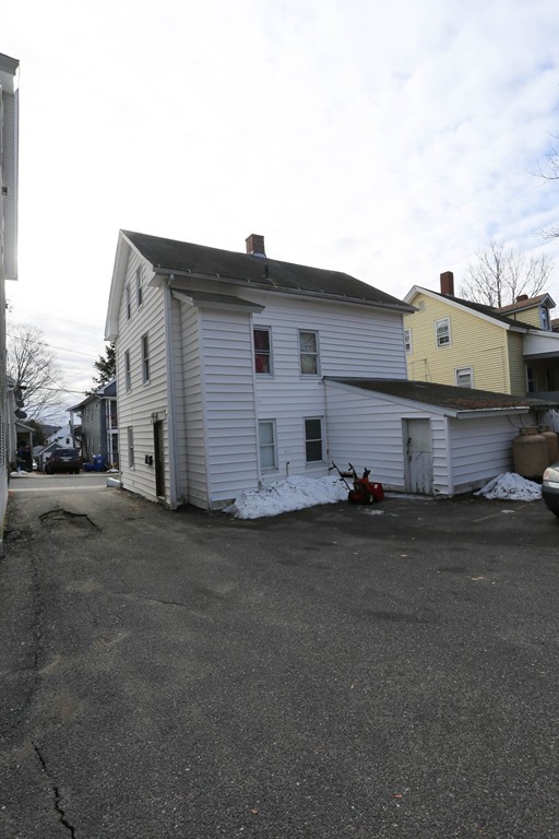 22 Vigeant Street Ware, MA 01082 - Photo 3 of 16 a view of a house with a yard