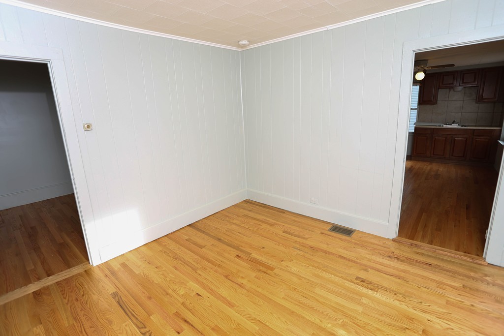 22 Vigeant Street Ware, MA 01082 - Photo 8 of 16 a view of empty room with wooden floor