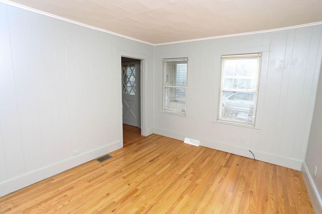 22 Vigeant Street Ware, MA 01082 - Photo 9 of 16 a view of empty room with wooden floor and fan
