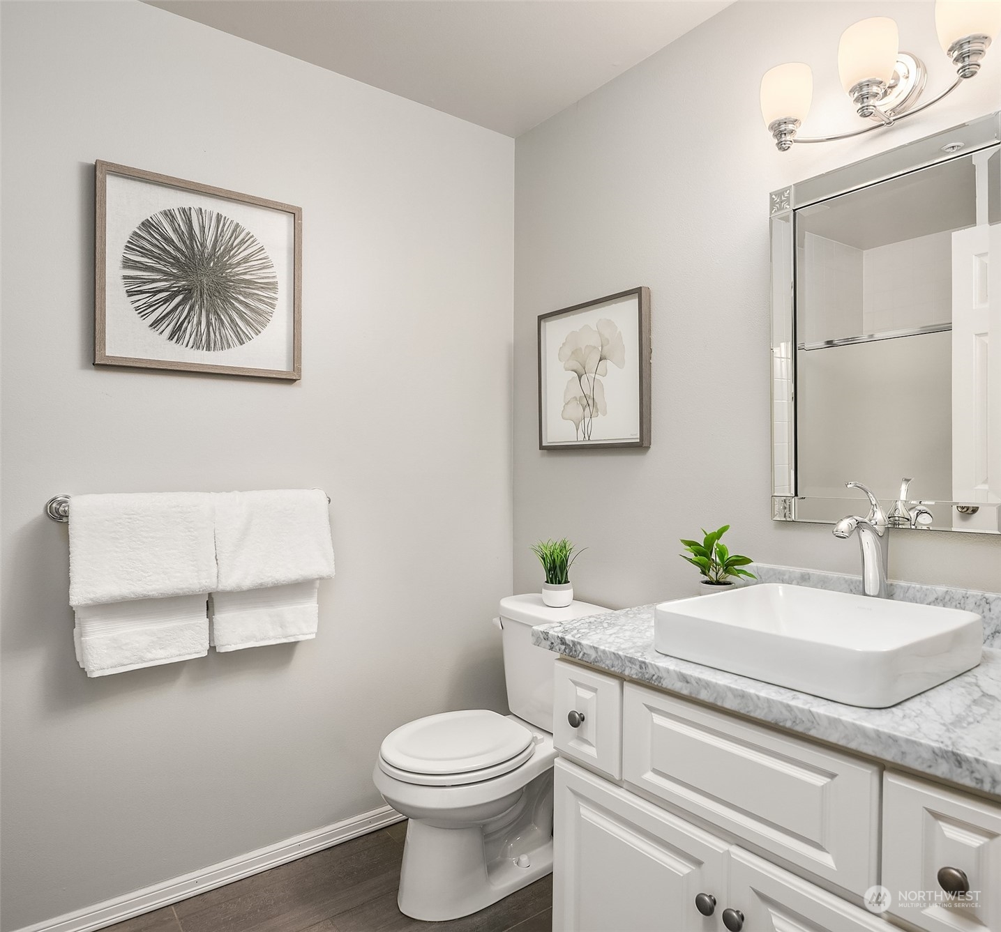 7207 210th Street Southwest, Unit 201 Edmonds, WA 98026 - Photo 13 of 19 a bathroom with a granite countertop sink mirror and toilet