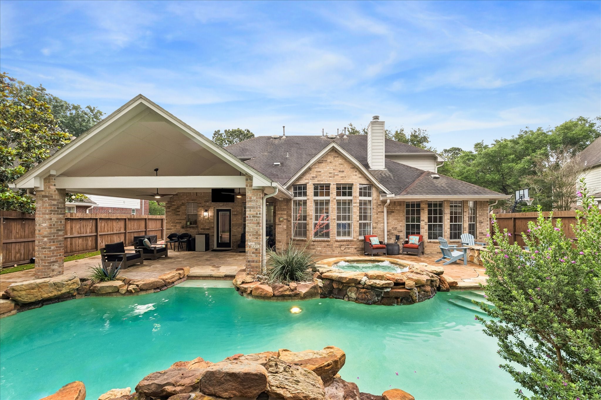 23039 Enchanted Landing Lane Katy, TX 77494 - Photo 29 of 30 a front view of a house with garden and swimming pool