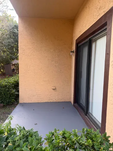 a view of backyard with green space