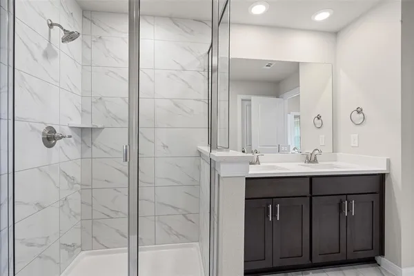 a bathroom with a sink and mirror