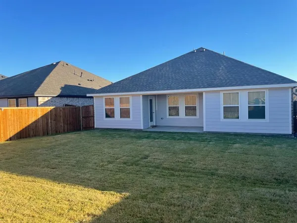 a house view with a garden space