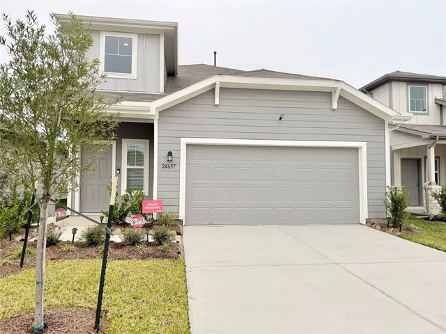 a front view of house with an outdoor space