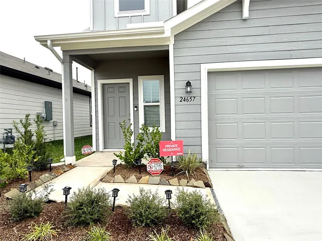 a view of house with outdoor space