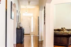a view of a bedroom with a window and storage