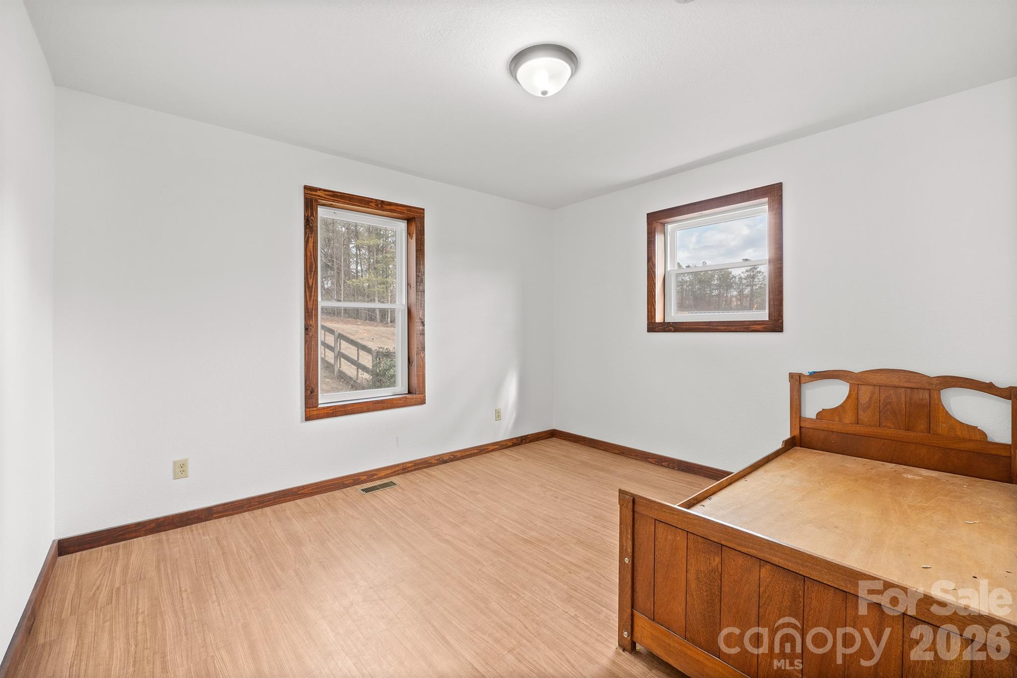 7400 Corn Hill Road Connelly Springs, NC 28612 - Photo 26 of 41 a bedroom with a bed and a window