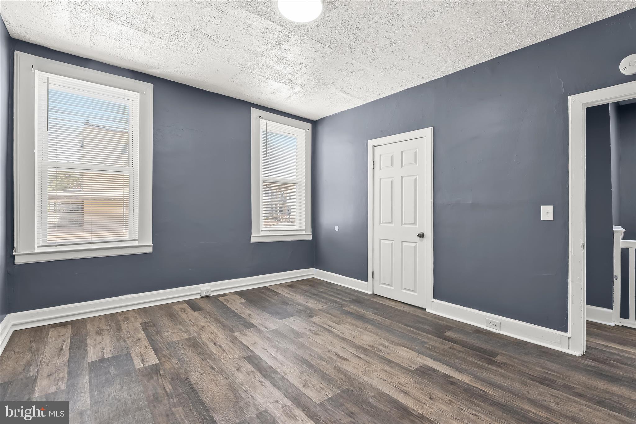 3534 Overview Road Baltimore, MD 21215 - Photo 21 of 28 an empty room with windows and closet