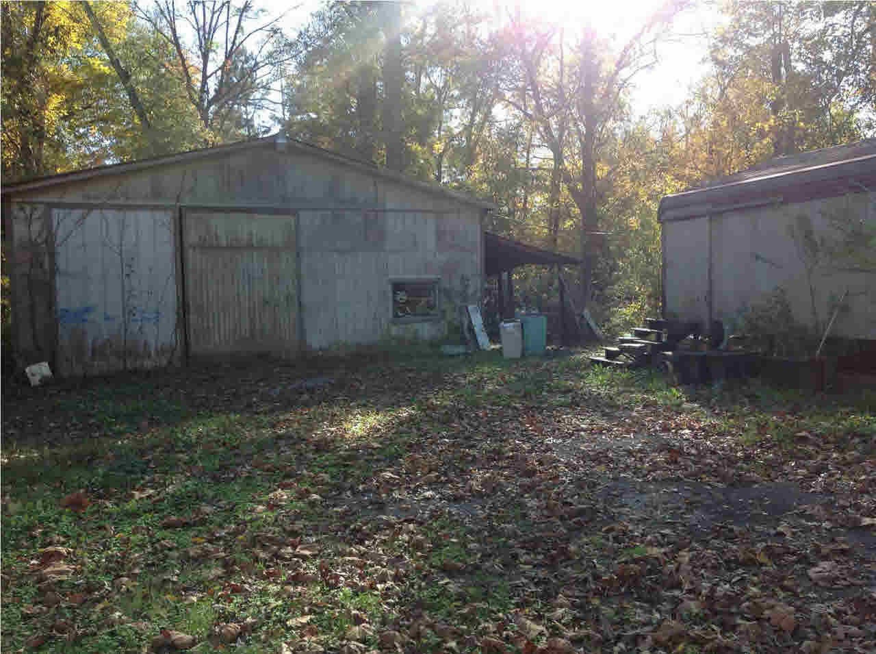176 Coon Hunters Road Brandon, MS 39042 - Photo 15 of 17 Side yard and two workshops.