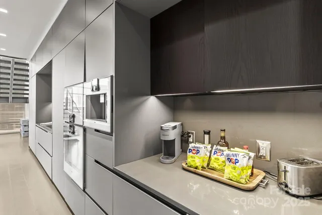 a bedroom with furniture and a fireplace