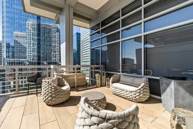 a outdoor living space with furniture and a potted plant