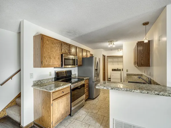 $285,000 | 1120 Pecks Woods Drive, New Brighton, MN 55112