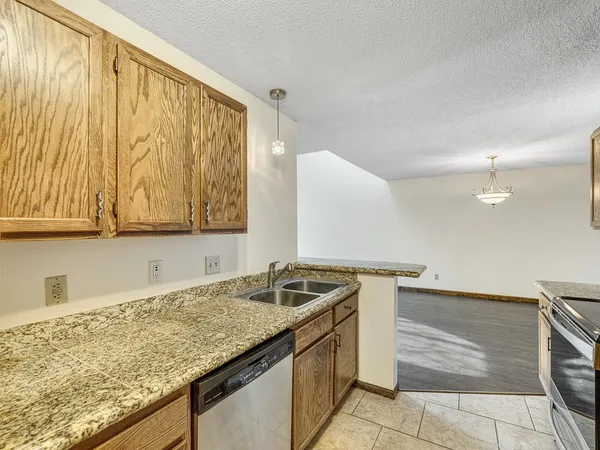 $285,000 | 1120 Pecks Woods Drive, New Brighton, MN 55112