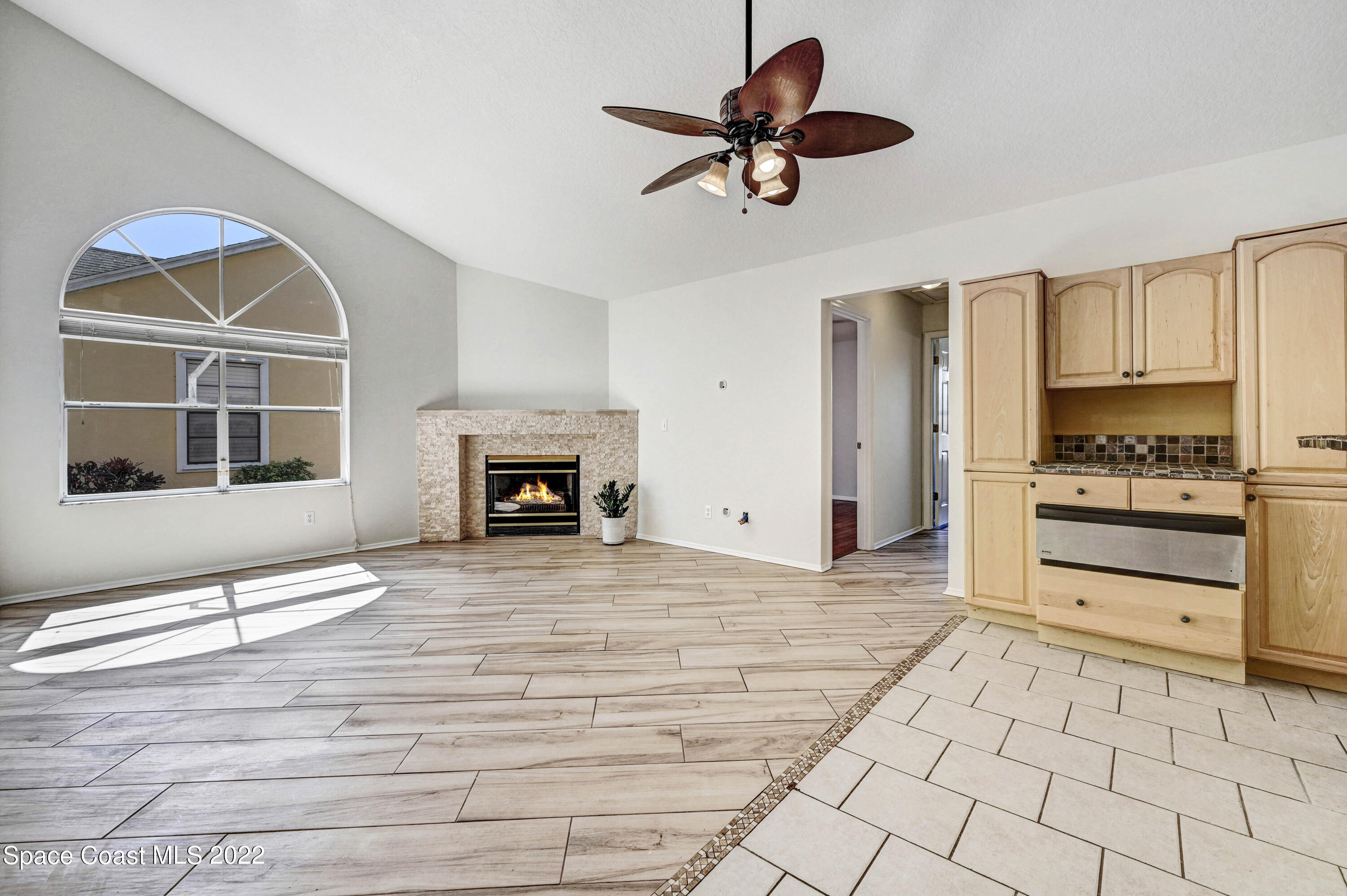 930 Turtle Pond Way Melbourne, FL 32940 - Photo 16 of 56 DSCFamily Room /Kitchen_2218
