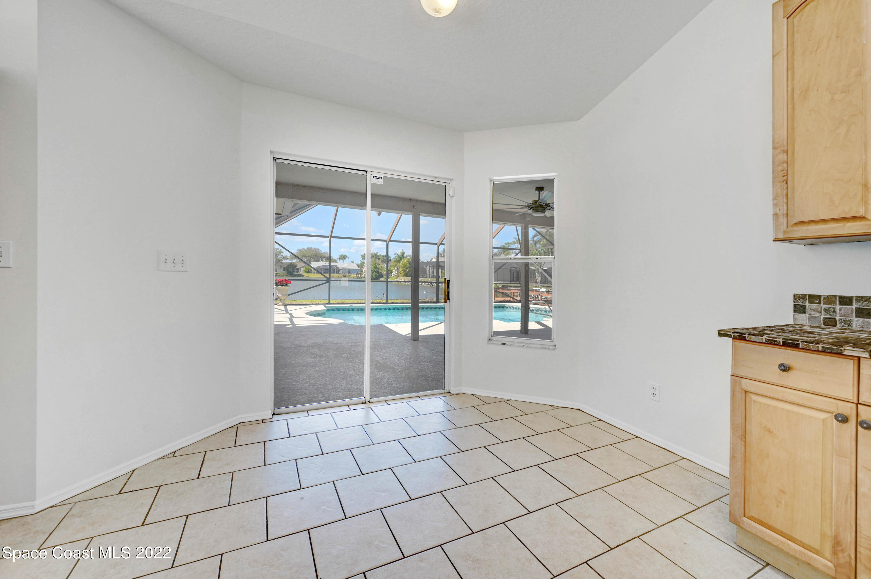 930 Turtle Pond Way Melbourne, FL 32940 - Photo 18 of 56 a view of an empty room with a window