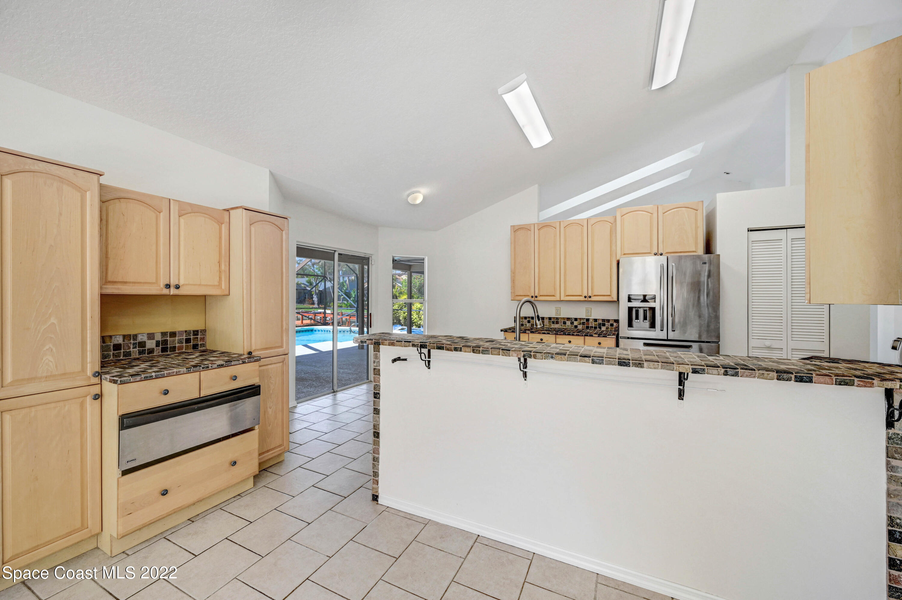 930 Turtle Pond Way Melbourne, FL 32940 - Photo 20 of 56 Kitchen from Family Room