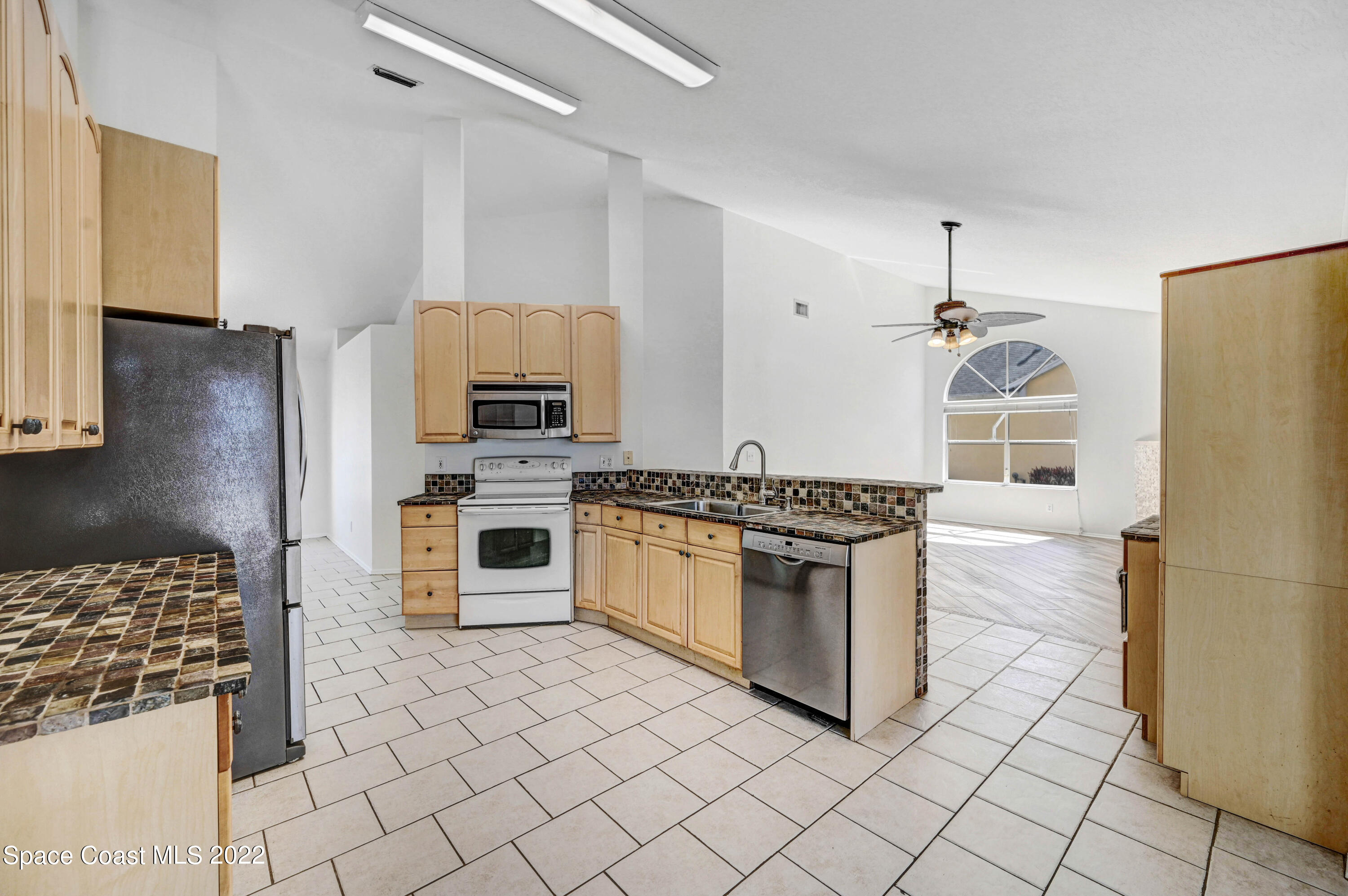 930 Turtle Pond Way Melbourne, FL 32940 - Photo 24 of 56 Kitchen / Family Room