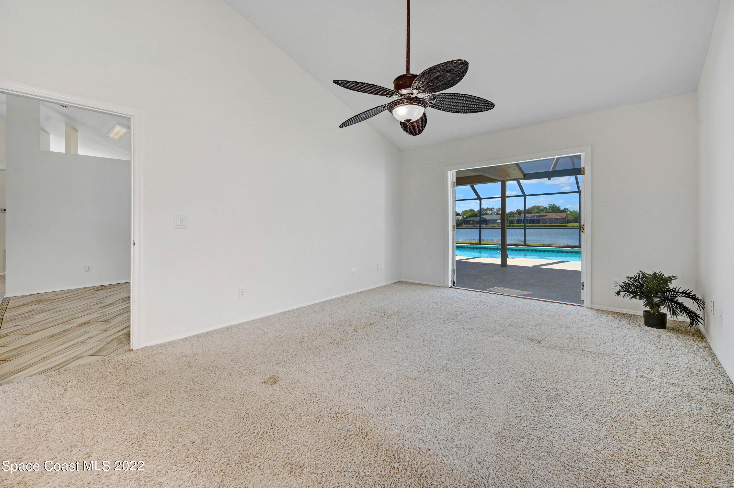 930 Turtle Pond Way Melbourne, FL 32940 - Photo 25 of 56 a view of an empty room with a window