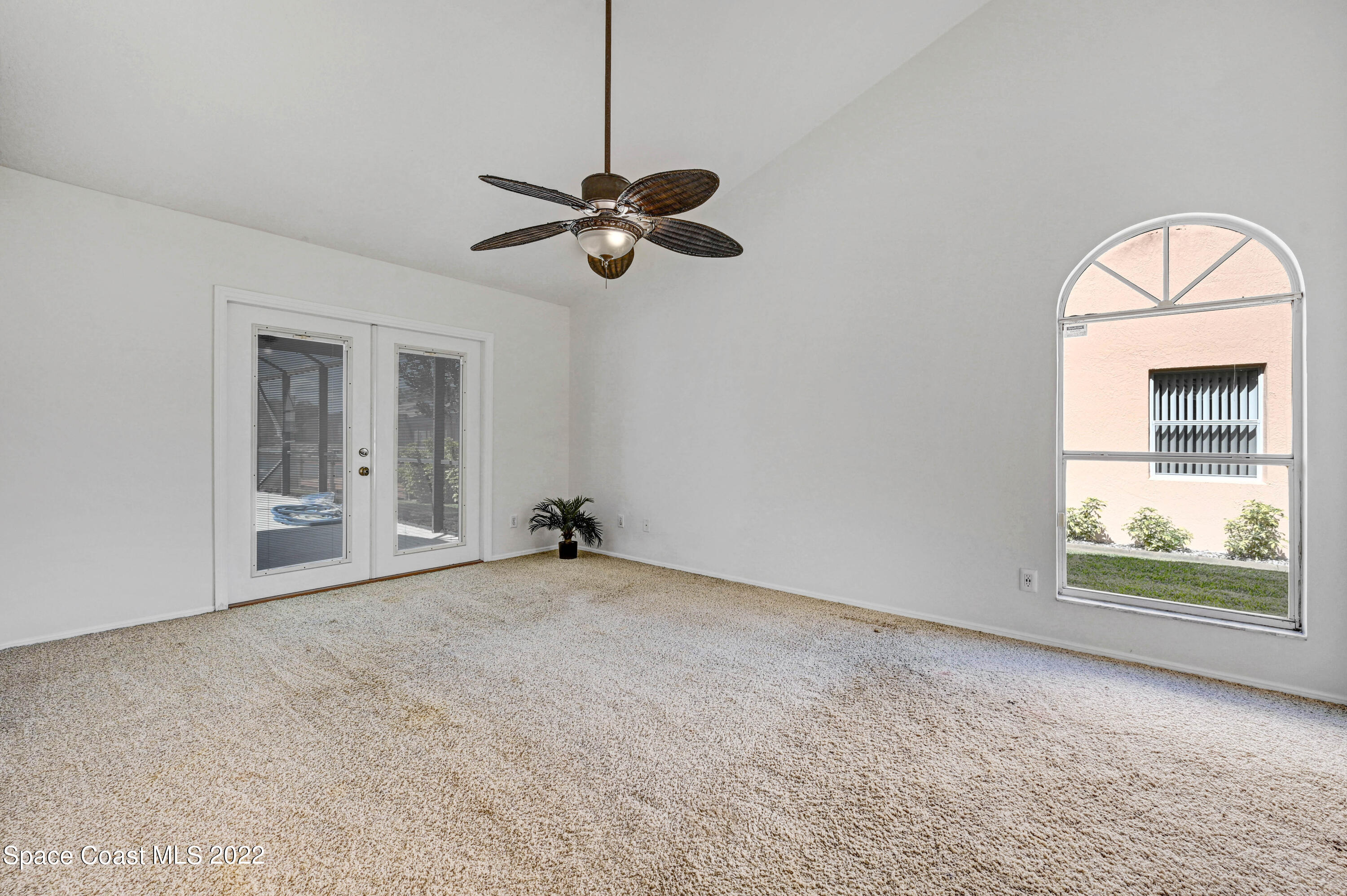 930 Turtle Pond Way Melbourne, FL 32940 - Photo 26 of 56 a view of an empty room with a window
