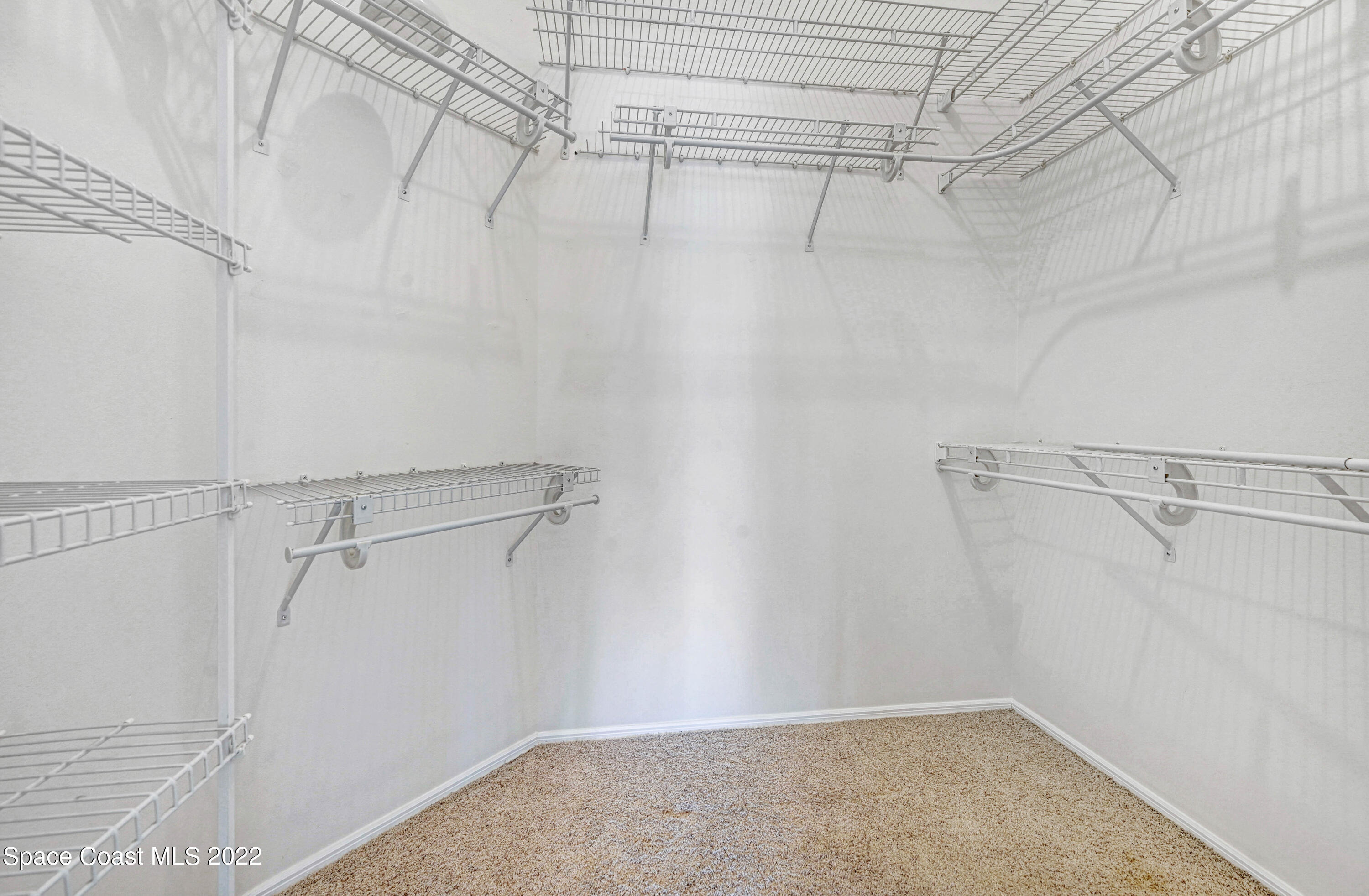 930 Turtle Pond Way Melbourne, FL 32940 - Photo 28 of 56 Master Bedroom Walk-in closet