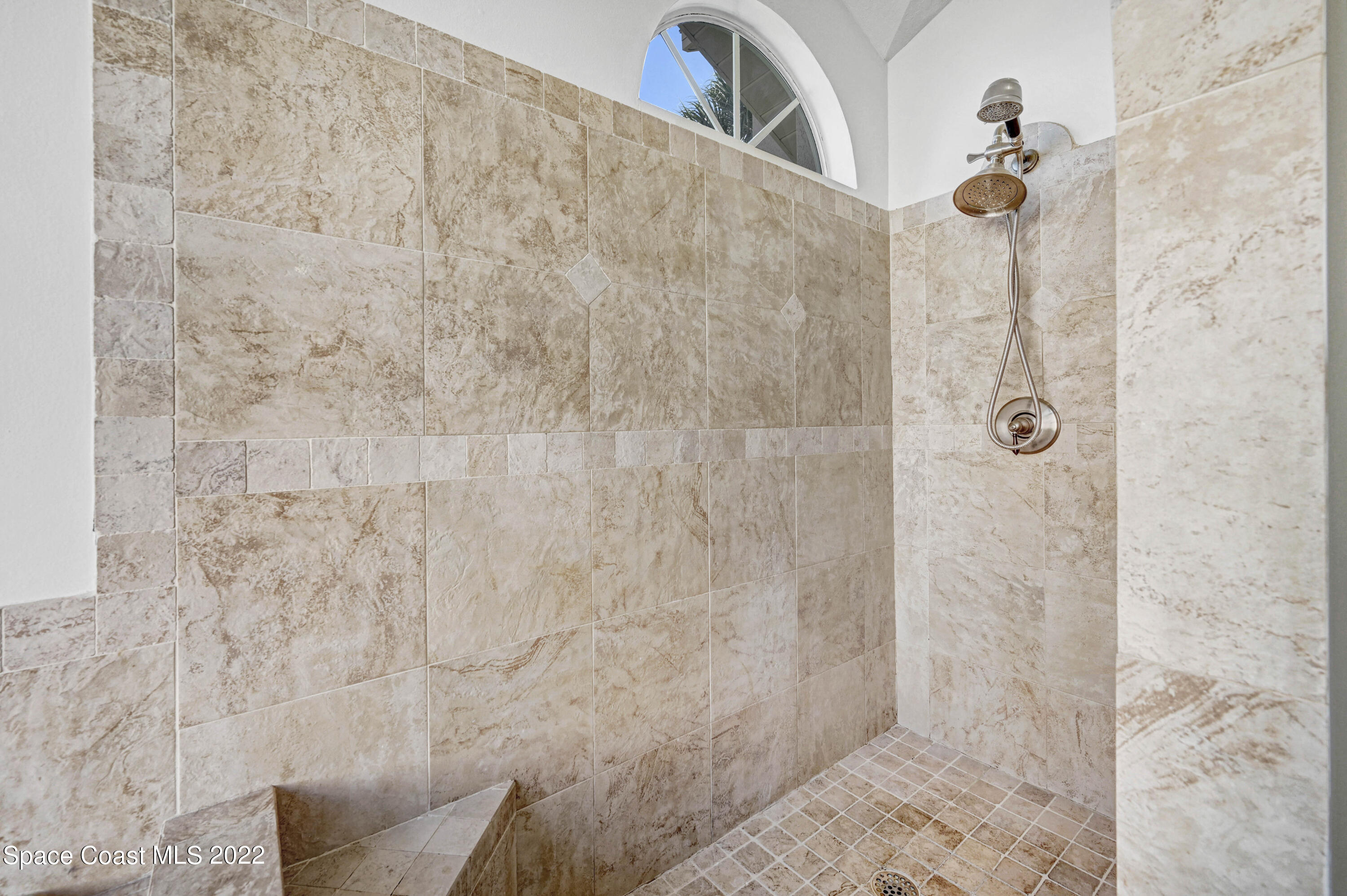 930 Turtle Pond Way Melbourne, FL 32940 - Photo 31 of 56 a bathroom with a shower