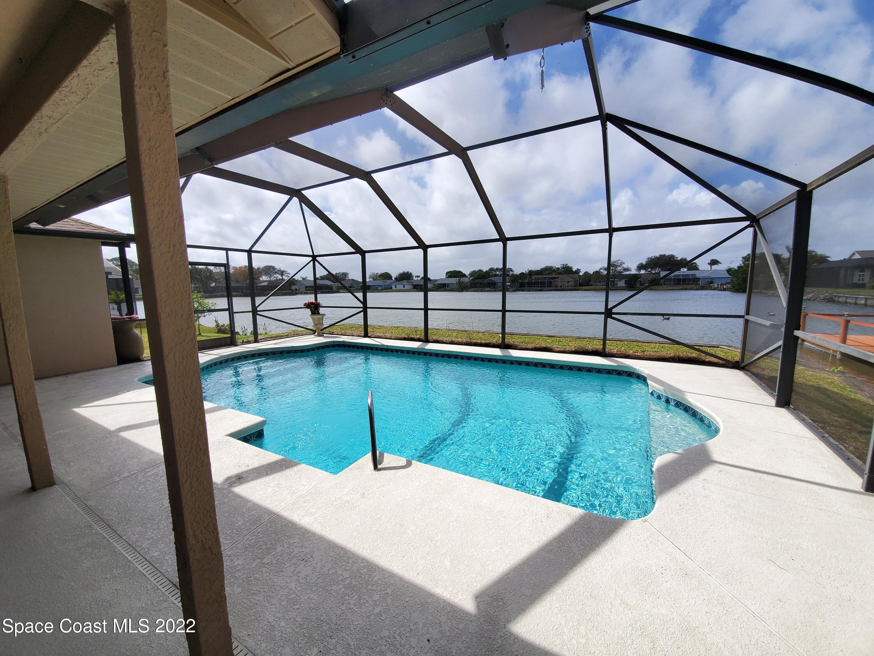 930 Turtle Pond Way Melbourne, FL 32940 - Photo 38 of 56 Pool and Lake View