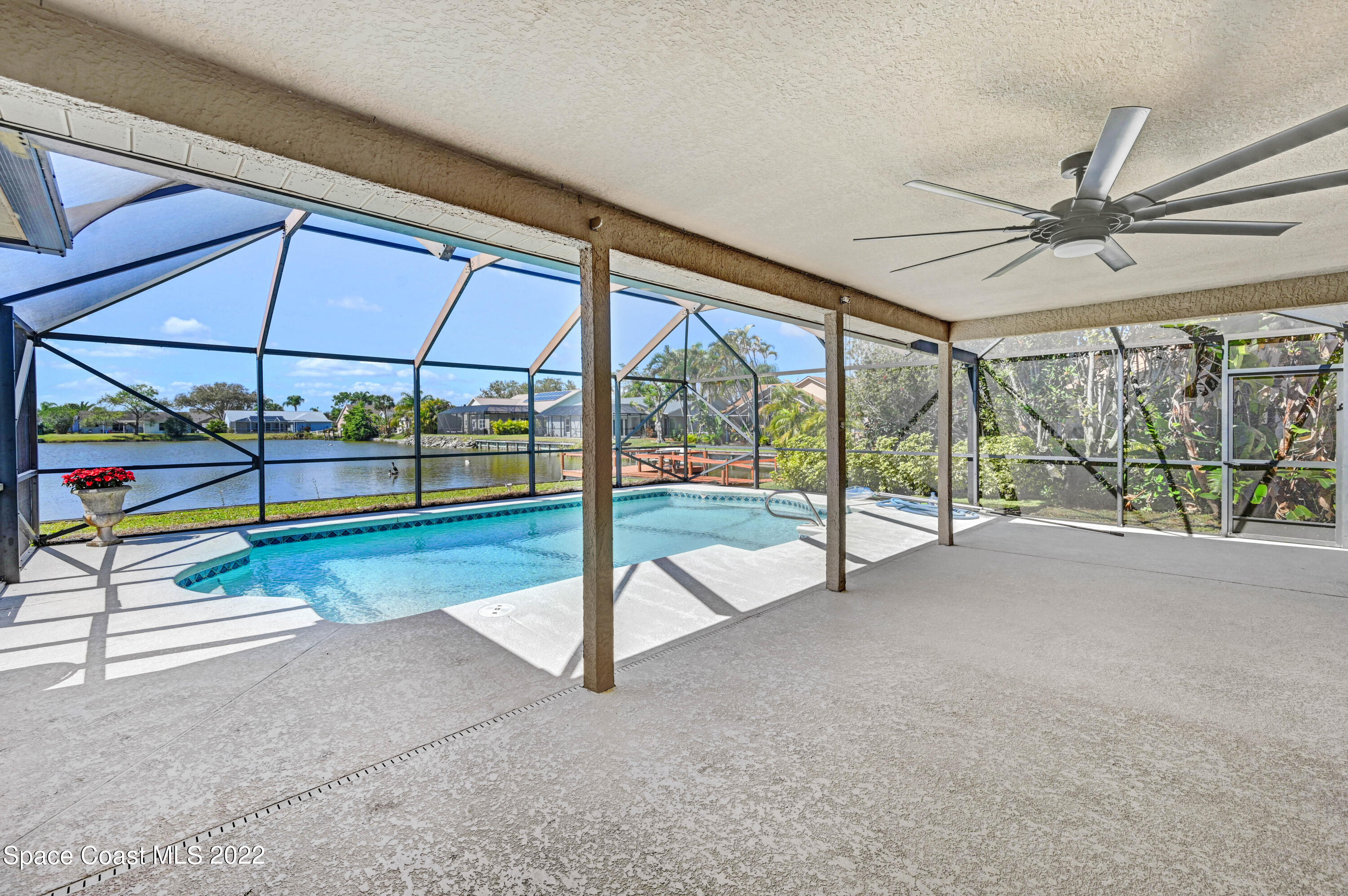 930 Turtle Pond Way Melbourne, FL 32940 - Photo 39 of 56 a view of an empty room with sliding door