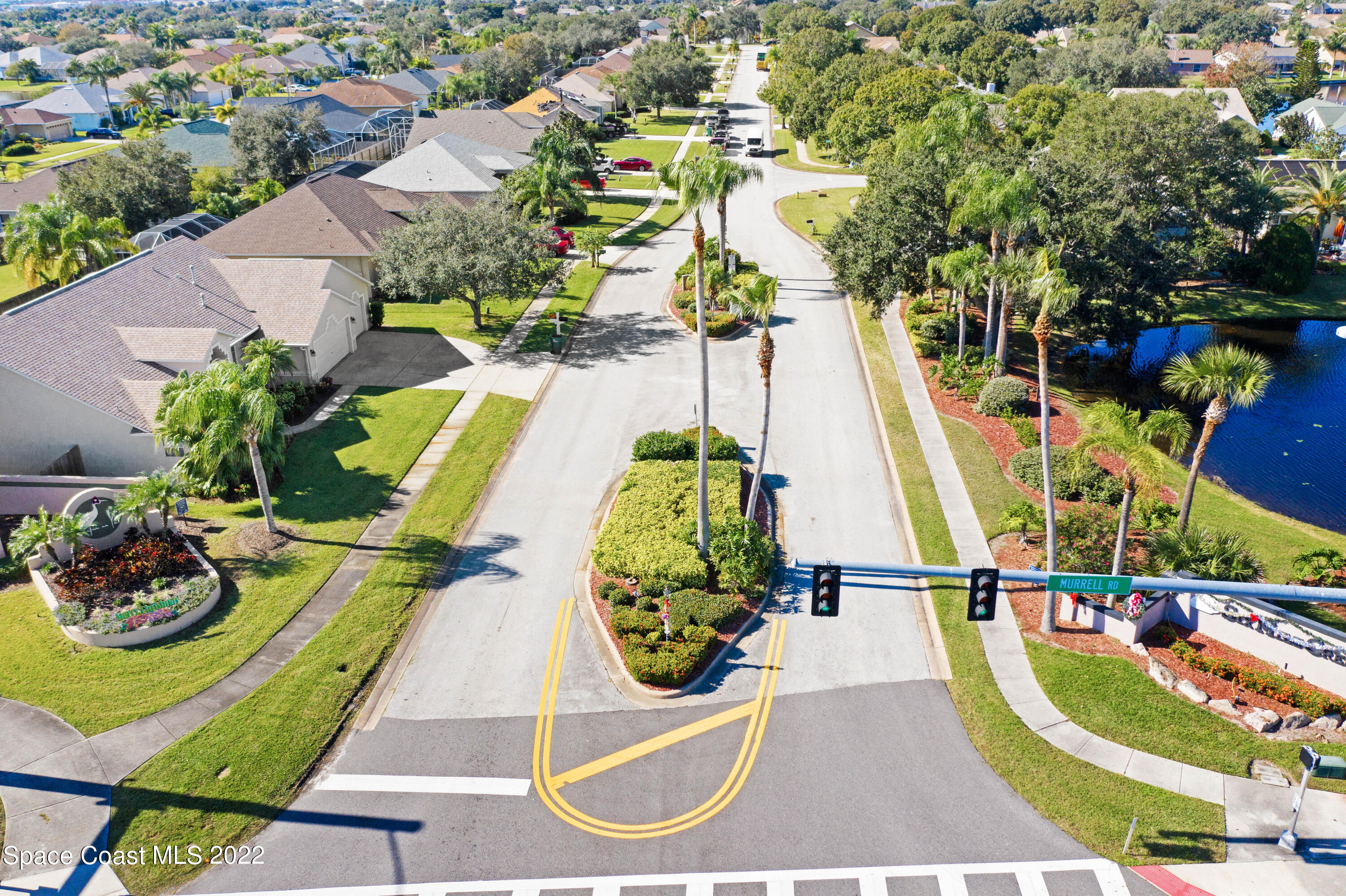 930 Turtle Pond Way Melbourne, FL 32940 - Photo 44 of 56 a view of a swimming pool with sitting area