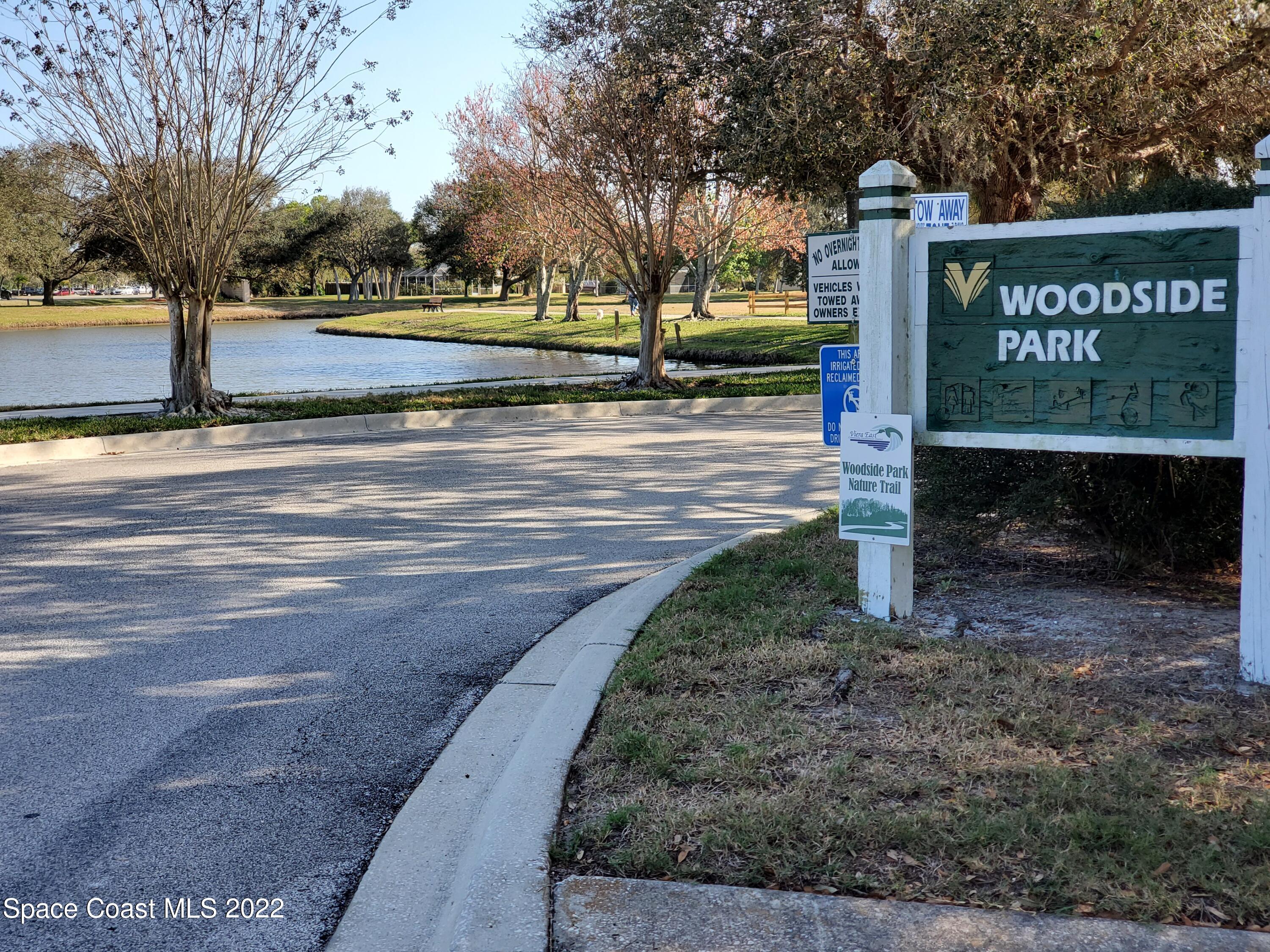 930 Turtle Pond Way Melbourne, FL 32940 - Photo 47 of 56 a view of a street with benches