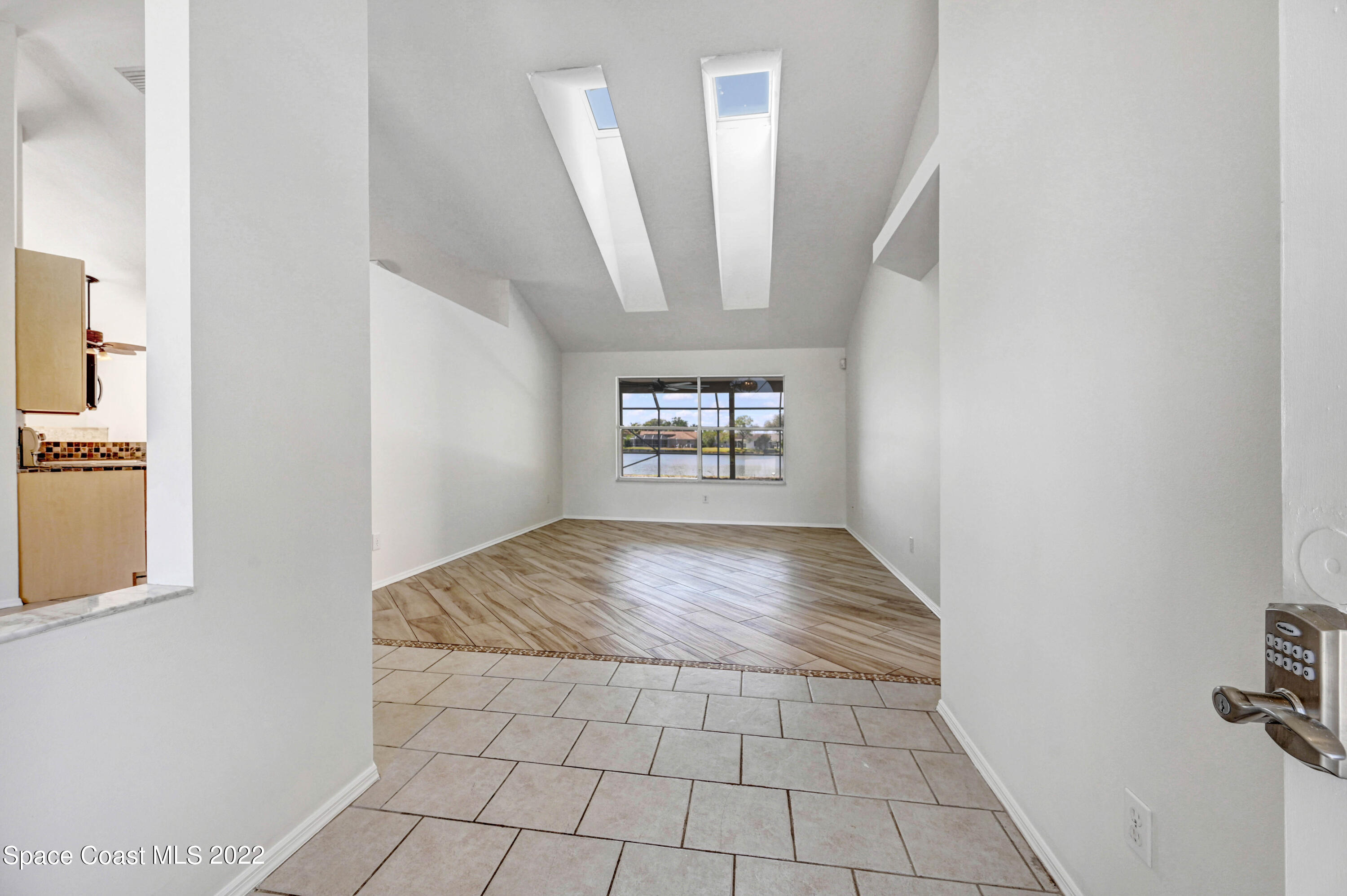 930 Turtle Pond Way Melbourne, FL 32940 - Photo 9 of 56 a view of an empty room and a window