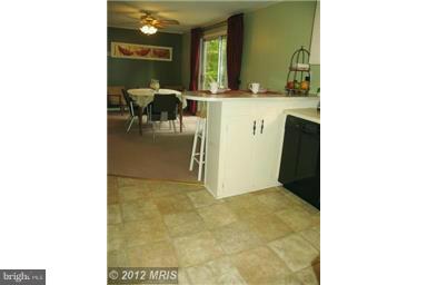 179 Ryan Road Pasadena, MD 21122 - Photo 17 of 30 Kitchen Opens to Dining Room
