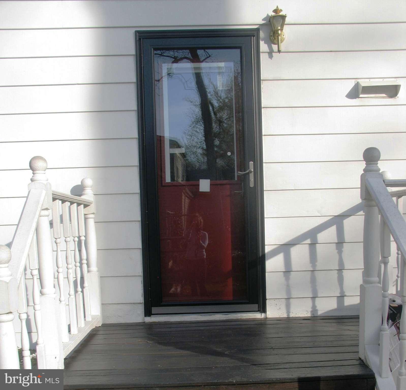 179 Ryan Road Pasadena, MD 21122 - Photo 28 of 30 New Custom Back Door w/Storm Door