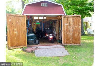179 Ryan Road Pasadena, MD 21122 - Photo 29 of 30 Huge Ramped Shed w/ Powered Workshop