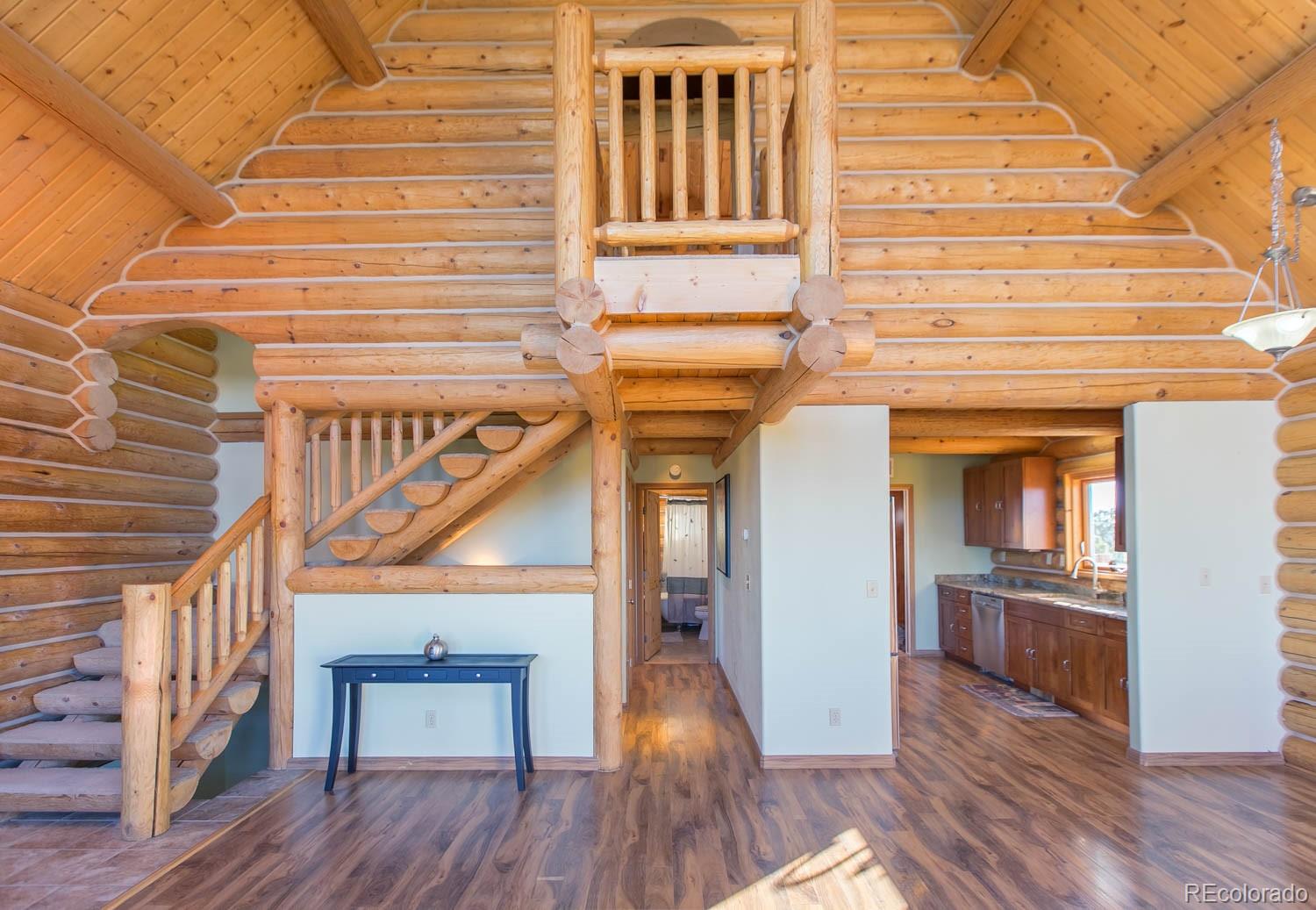 18342 Miller Canyon Ranch Road Glade Park, CO 81523 - Photo 11 of 38 a view of entryway and hall with wooden floor