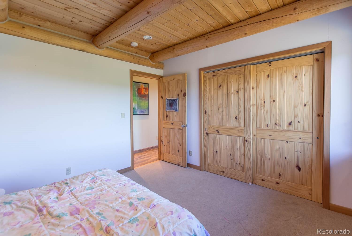 18342 Miller Canyon Ranch Road Glade Park, CO 81523 - Photo 15 of 38 a view of a livingroom with an empty space
