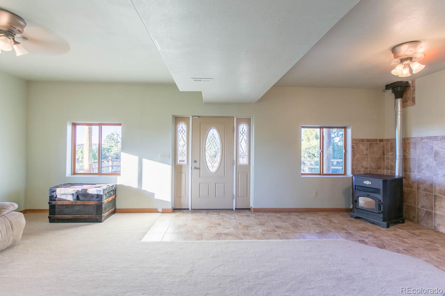 18342 Miller Canyon Ranch Road Glade Park, CO 81523 - Photo 23 of 38 a view of livingroom with window