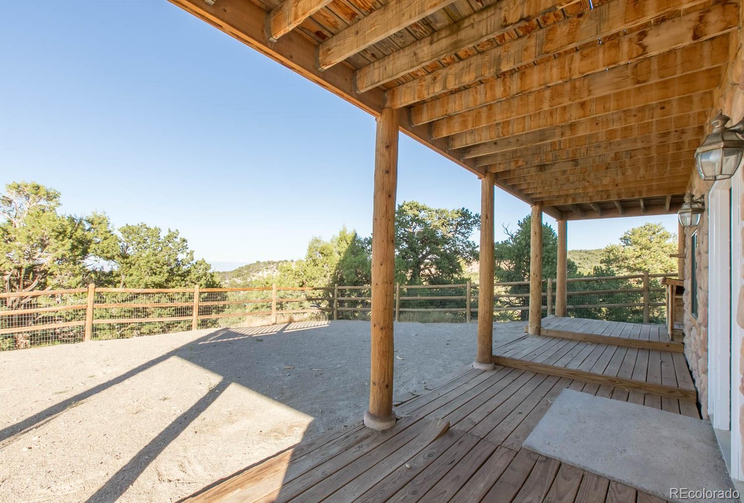 18342 Miller Canyon Ranch Road Glade Park, CO 81523 - Photo 31 of 38 a view of a balcony with wooden floor