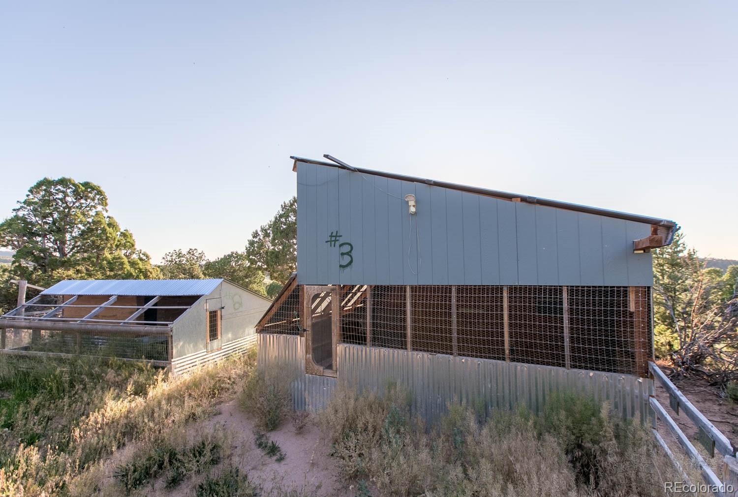 18342 Miller Canyon Ranch Road Glade Park, CO 81523 - Photo 32 of 38 front view of house with a yard