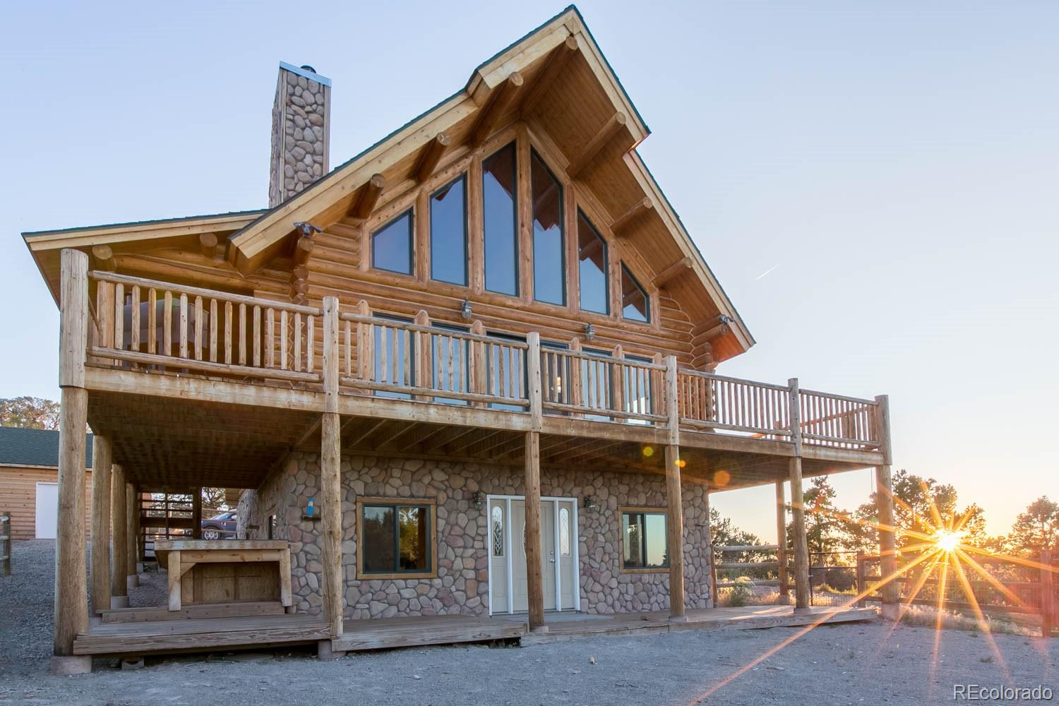 18342 Miller Canyon Ranch Road Glade Park, CO 81523 - Photo 33 of 38 a view of a house with wooden floor